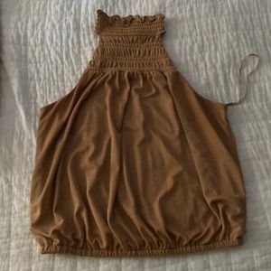 Gold sleeveless shirt